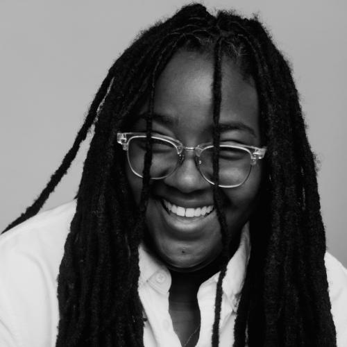 C.A. Johnson smiling in black and white